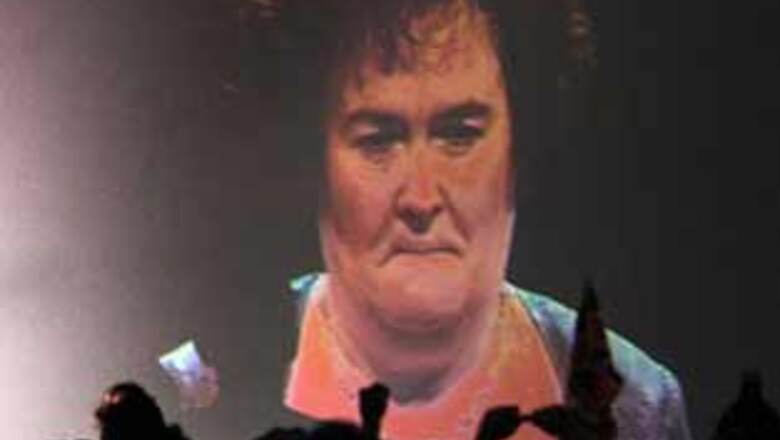 Susan Boyle calls fame a 'demolition ball'
