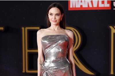 Angelina Jolie Wears Versace Custom Dress for Rome International Film Festival Red Carpet