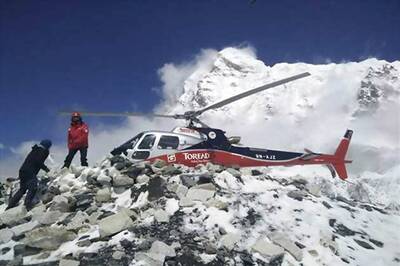 Helicopters ferry injured and heavily pregnant woman from Nepal villages near epicentre