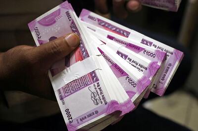Rupee Bounces 12 Paise on Dollar's Global Weakness