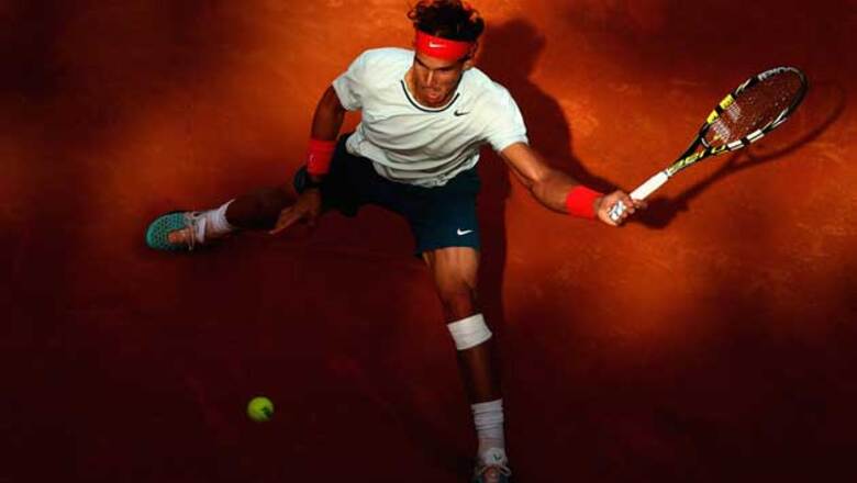 Emotional Nadal reaches Rome final, Serena rolls on