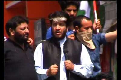 Pakistan flags flown at a rally held by Kashmiri separatist leader Shabir Ahmad Shah