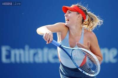 Agnieszka Radwanska out, Maria Sharapova survives US Open threat
