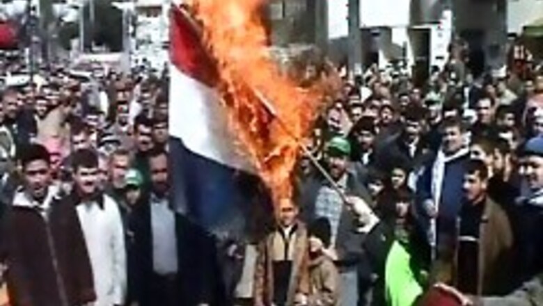 Cartoon fury: Two embassies torched