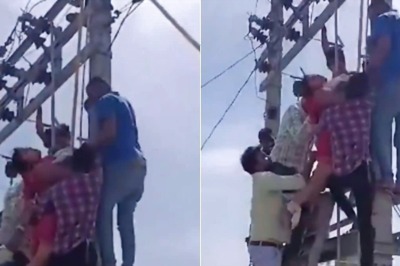 Woman Cheating On Husband Climbs Electric Pole After Affair Busted, Wants All To Live Together | Video