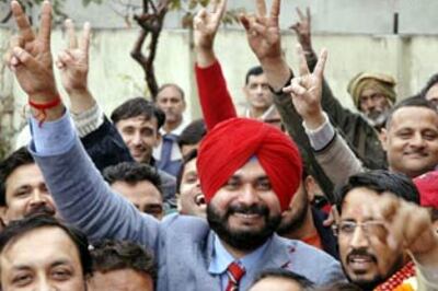 Sidhu rides elephant to file nomination