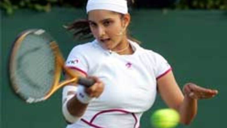 Sania, Peer move into third round