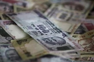 Rupee rebounds from over 7-week lows, ends up 13 paise at 60.03 vs US dollar
