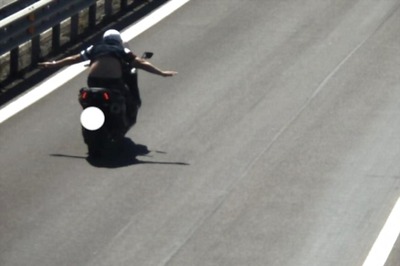 Motorist Fined Rs 48,000 for Riding Scooter at 127 kmph With No Hands on Highway