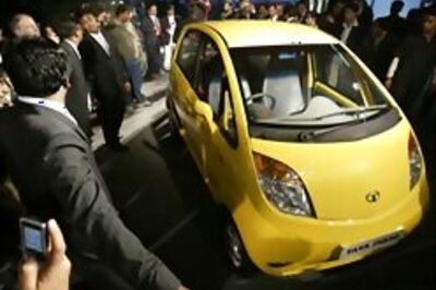 Tata bats for Buddha, attacks Mamata through ads