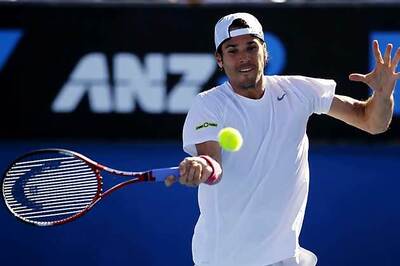 Haas progresses in Florida, Nishikori retires injured