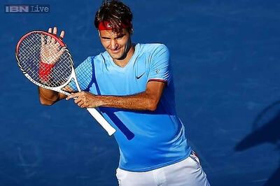 Federer, Wawrinka win as Switzerland lead Italy 2-0 in Davis Cup