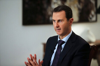 Syria's opposition says Assad must go, dead or alive