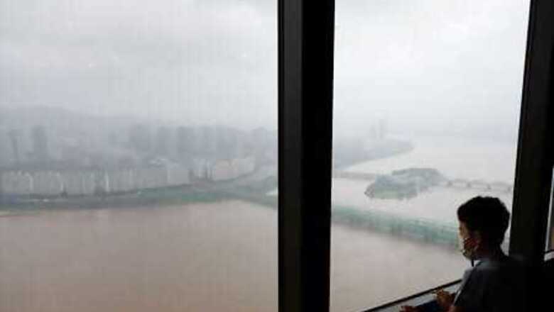 South Korea searches for rescue workers missing in floods