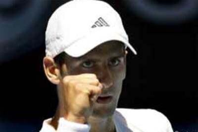 Djokovic crushes Davydenko to win Masters Cup