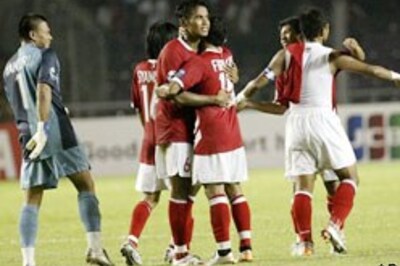 China, Indonesia win in Asian Cup football
