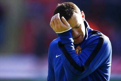 Gary Neville expects Rooney to stay