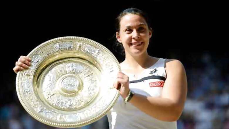 Marion Bartoli thrashes Sabine Lisicki to win Wimbledon title