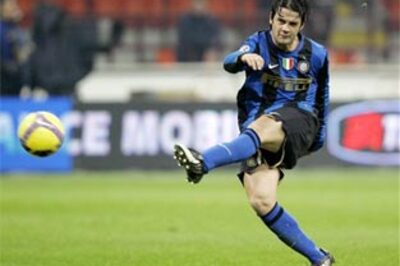 Inter need extra time to beat 10-man Genoa