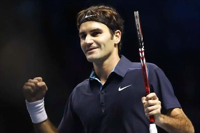 Federer dismisses Tipsarevic for Madrid final