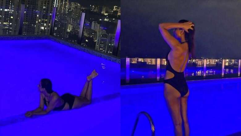 Sexy! Nia Sharma Sets Temperature Soaring As She Enjoys In a Pool In a Black Hot Cut-Out Swimsuit