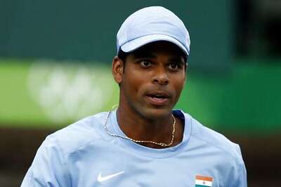 Vishnu scrapes past Ashwin to enter 2nd round