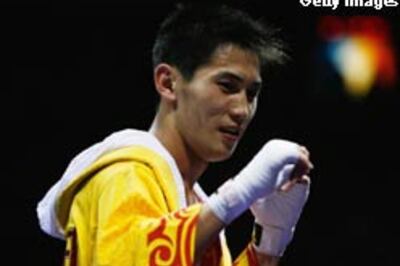 Gu Yu upsets British boxing hope Murray