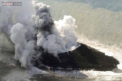 Volcano raises new island far south of Japan