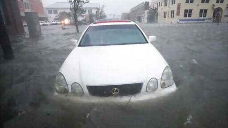 AP Photo Gallery: Sally's Deluge Swamps Streets, Ruins Cars