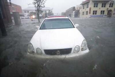 AP Photo Gallery: Sally's Deluge Swamps Streets, Ruins Cars