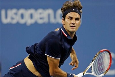 Federer eases past Young to reach second round