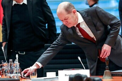 Scholz To Germans: Let's All Help To Defeat COVID In 2022