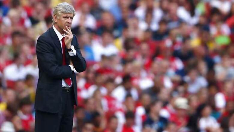Wenger hears fans' rage at stormy Arsenal meeting