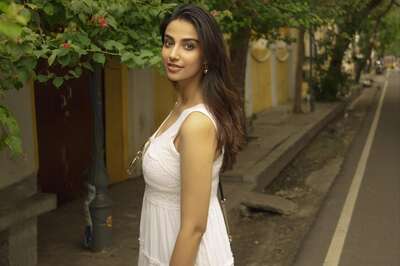Actress Meenaakshi Chaudhary Raises Temperatures In Sleeveless White Dress
