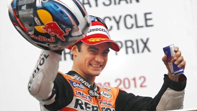 Pedrosa weathers storm to claim Malaysia victory