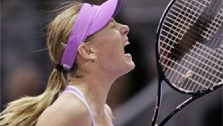 Sharapova marches on, beats Clijsters