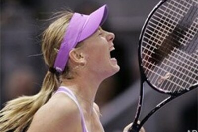 Sharapova marches on, beats Clijsters
