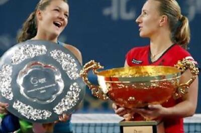 Djokovic and Kuznetsova win China Open titles