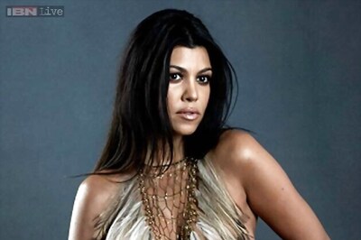 Pregnant Kourtney Kardashian poses nude for a magazine cover