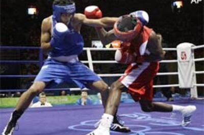 Boxer Vijender loses in semis, gets bronze