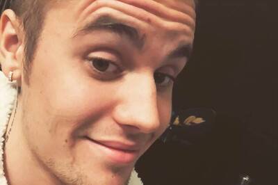 Justin Bieber's Laptop Has an Angelina Jolie Sticker on it, See Here