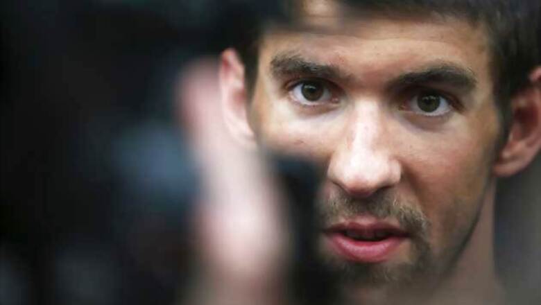 Phelps starts life out of the water