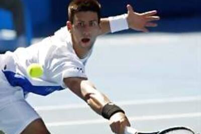 Djokovic marches into Australian Open semis