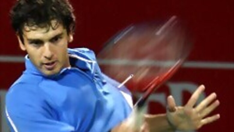 Robredo, Ancic advance into quarters