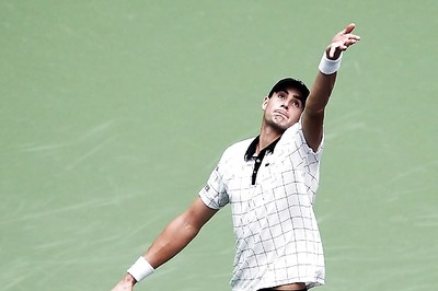 Isner out of Australian Open with injured knee