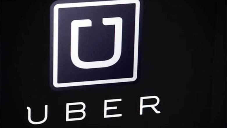 Hong Kong police arrest Uber drivers, search office: Reports