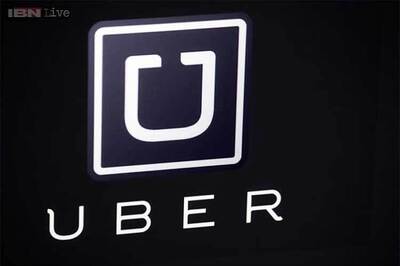 Hong Kong police arrest Uber drivers, search office: Reports