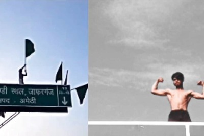 In UP's Amethi, Man Climbs 20-foot High Signboard And Waves A Flag