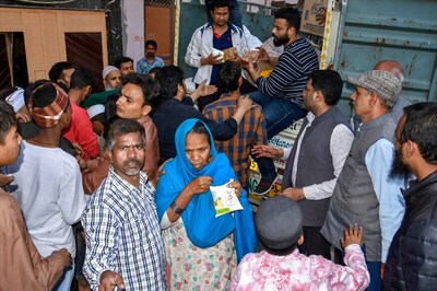 An Anxious Wait outside Mortuary for Family Members Awaiting News of Loved Ones Missing Since Riots
