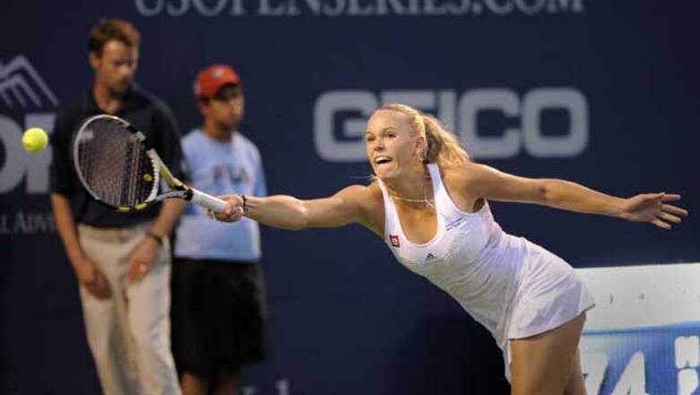 Pennetta lets Wozniacki into Pilot Pen semis